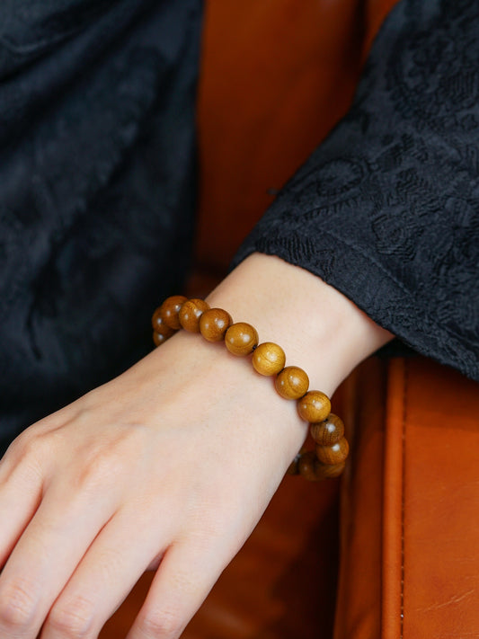 Calm Compass wrist talisman Rosewood to encourage prosperity, courage and calm action