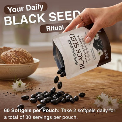 Black seeds poured from the pouch beside a bowl of seeds