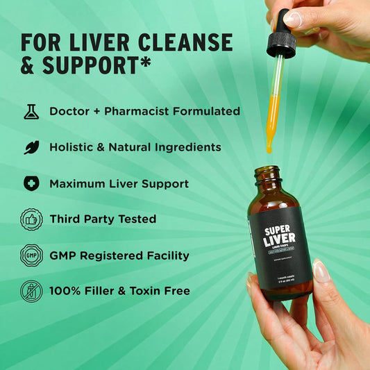 Dropper releasing the herbal liquid with milk thistle and dandelion