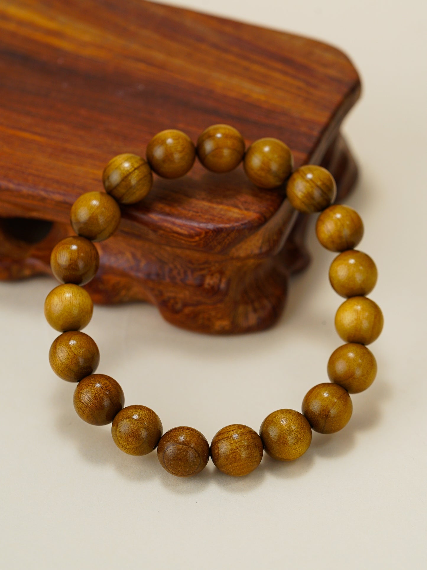 Calm Compass wrist talisman Rosewood to encourage prosperity, courage and calm action