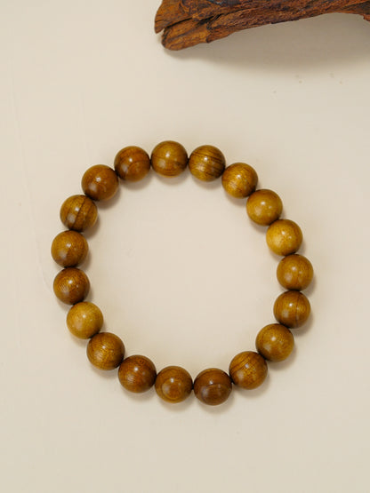Calm Compass wrist talisman Rosewood to encourage prosperity, courage and calm action
