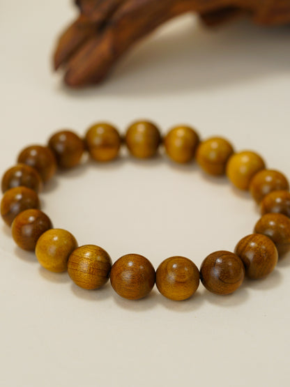 Calm Compass wrist talisman Rosewood to encourage prosperity, courage and calm action