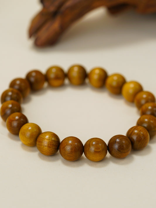 Calm Compass wrist talisman Rosewood to encourage prosperity, courage and calm action